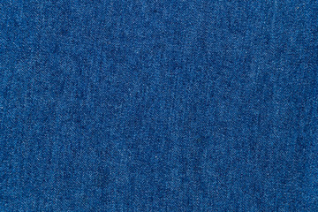 Detail of nice blue jeans textile tuxture for background with vintage tone.