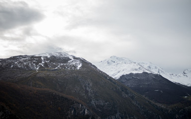 Landscape of mountains with snowy peaks in Picos de Europa in Cantabria