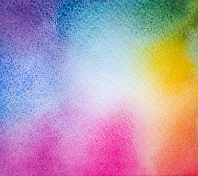 Colorful watercolor splashing in the paper. Abstract hand drawn it is wet texture background with paint brushes. Picture for creative wallpaper or design art work. Pastel colors tone.