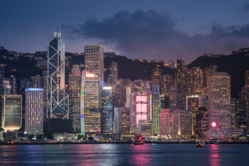 Fototapeta na wymiar Skyline Hong Kong city at twilight time view from harbor in Hong Kong.