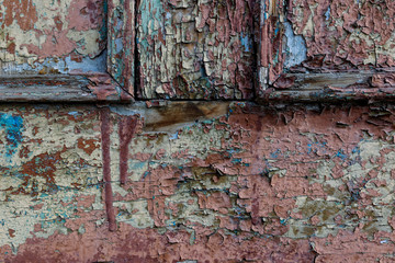 old wood wall with peeling paint