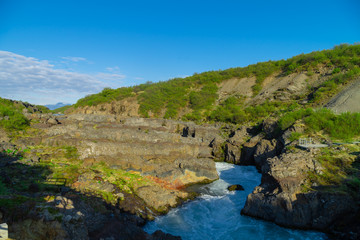 Iceland. mountain river flowing down from the glacier. Journey around the island. The Landscape Of Iceland. Tourism.