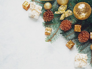 Christmas background golden cones, Christmas decorations, balls, bows, place for text