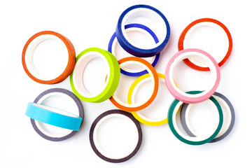 Collection of colorful adhesive tape pieces isolated on white background.