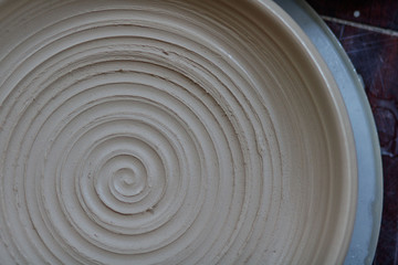 circle of pottery dishes