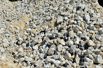 Natural gray gypsum stone. Close up image of stones with black and white. Industrial mining area. Limestone mining, quarry - Image