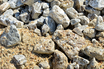 Natural gray gypsum stone. Close up image of stones with black and white. Industrial mining area. Limestone mining, quarry - Image