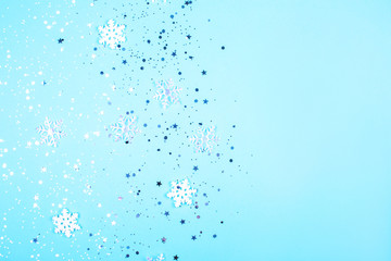 New Year or winter composition with snow flakes and glitter.
