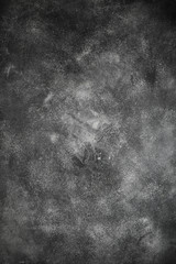 Dark moody black with grey concrete texture or background. With place for text and image