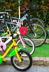 Fototapeta na wymiar Bicycles in family parking.