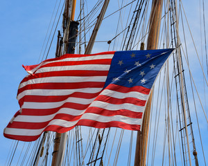 American Flag in front of Schooner Rigging