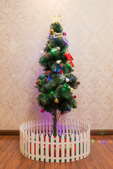 A Christmas tree with lots of ornaments