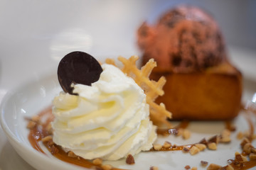 Whipping cream and Honey toast with strawberry chocolate chip icecream topping