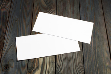 Two blank cards or papers (business cards, tickets, flyers, invitations, coupons, banknotes, etc.)...