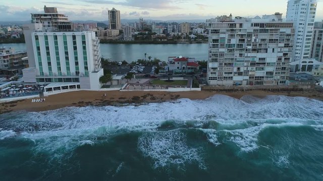 Droning towards Condado from the waters edge in Puerto Rico