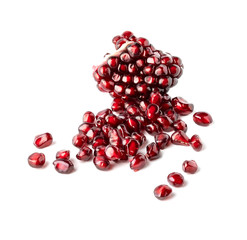 Pomegranate seed pile isolated on white background cutout
