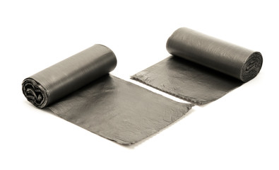 Roll of black plastic garbage bags isolated on the white background