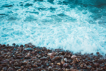 Seascape, view of stone beach and sea