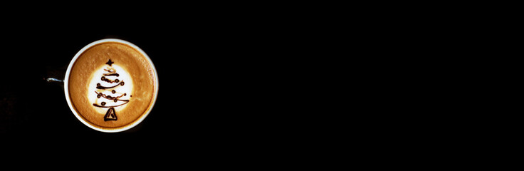 Tasty cappuccino with Christmas tree latte art