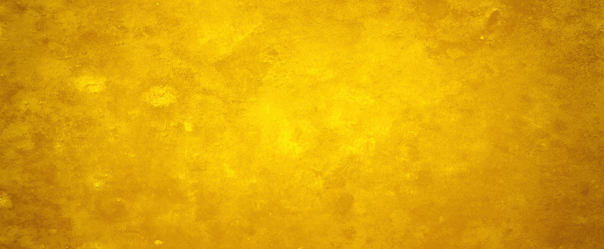 Grungy old gold background with vintage grunge design with peeling paint over rusted metal texture