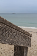 Wooden railings and a beach