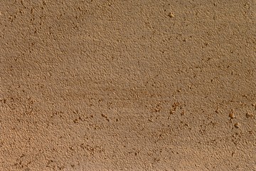 beautiful grunge orange stone like stucco texture for background use.