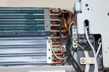 Inverter Air conditioning service, repair & maintenance concept. The specialist cleans and repairs...