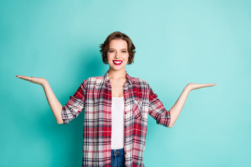 Portrait of positive cheerful girl hold hand present adverts promo suggest select sales discount...