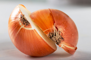 Onion, cut in half, isolated on white background