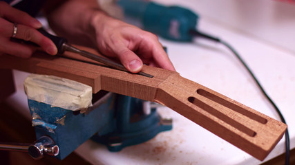 Guitar maker widen guitar neck truss rod 