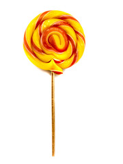 Candy on a stick isolated on a white background. Yellow gummy candy. Big caramel.