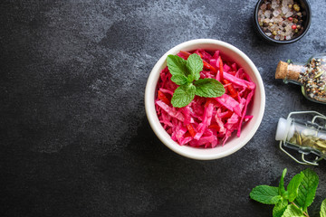 pickled cabbage with beets and vegetables (appetizer vegetables, snack) menu concept. food background. top view. copy space