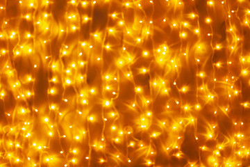 Abstract blur golden bokeh light Christmas holiday background