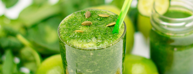 Green natural smoothie to detox and cleanse the body of toxins. For diet and weight loss. Banner.