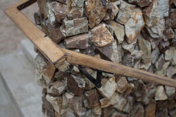 wood handrail with stone wall