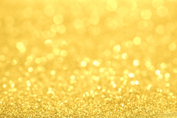 Luxury gold glitter with bokeh background, de-focused. concept for chrismas, holiday, happy new year, decoration.