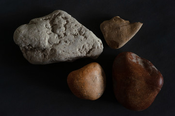stones on black background