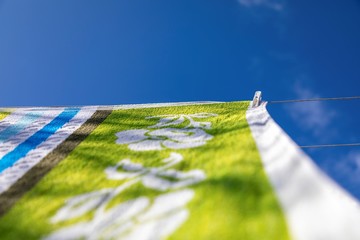 Laundry is drying outside on sunny day