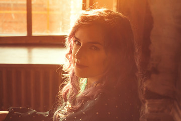 portrait of young woman with colored hair