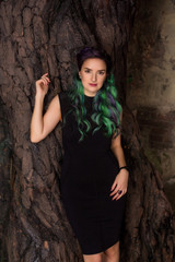 portrait of young woman with colored hair