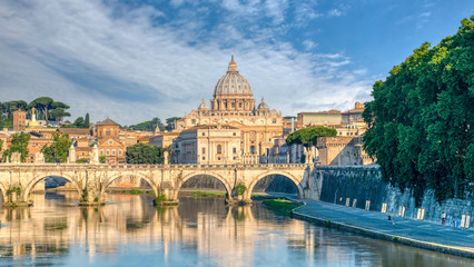 Fototapeta na wymiar A morning shot of Ponte Sant Angelo and the Vatican in the background