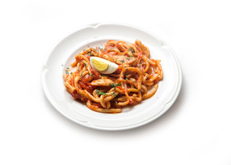 noodles with egg and tomato sauce on a plate