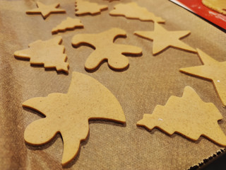 Close up of childs hands making christmas cookies
