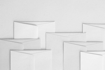 white abstract background, envelope in a regular disposition