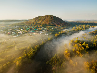 The remain of the reef of the ancient sea - solitary mountain Kushtau.