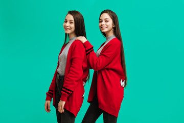 Beautiful twins wearing winter clothes