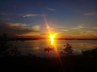 sunset over lake © Jhoana