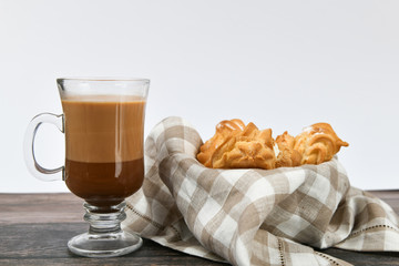 ocoa with cookies on a white background. A cup of delicious hot cocoa and cookies.