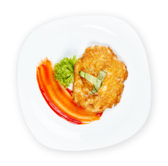 Chicken chop with cucumber and lettuce on a white plate