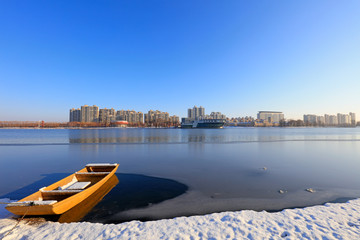 fishing boat in ice and snow